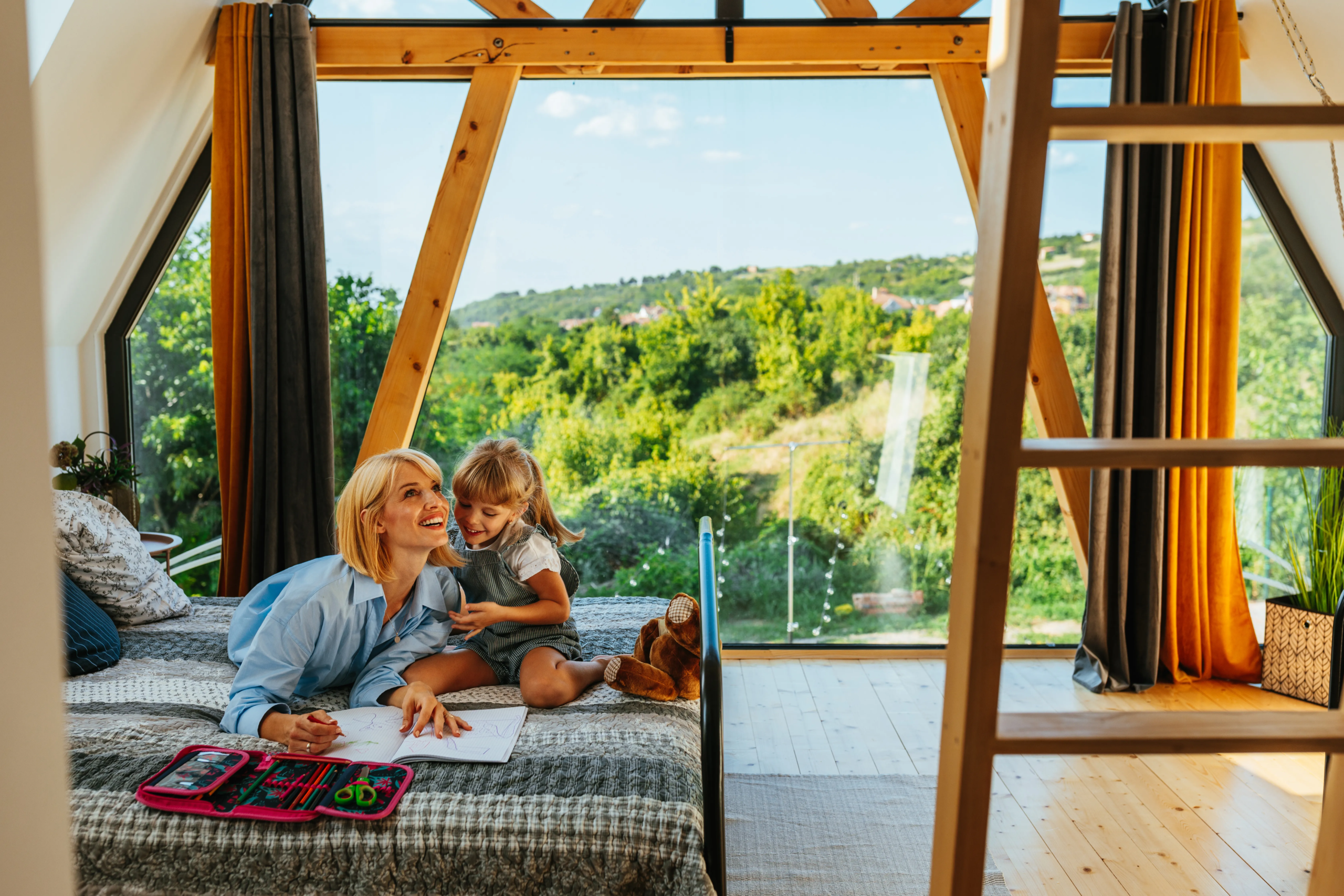 Sunny Villas mother-and-daughter-drawing-on-in-bedroom